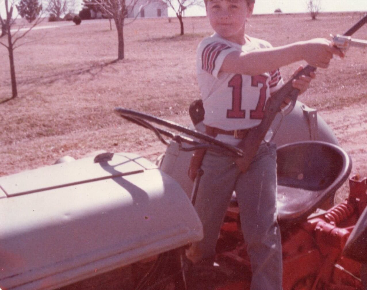 me on a tractor with a bb gun