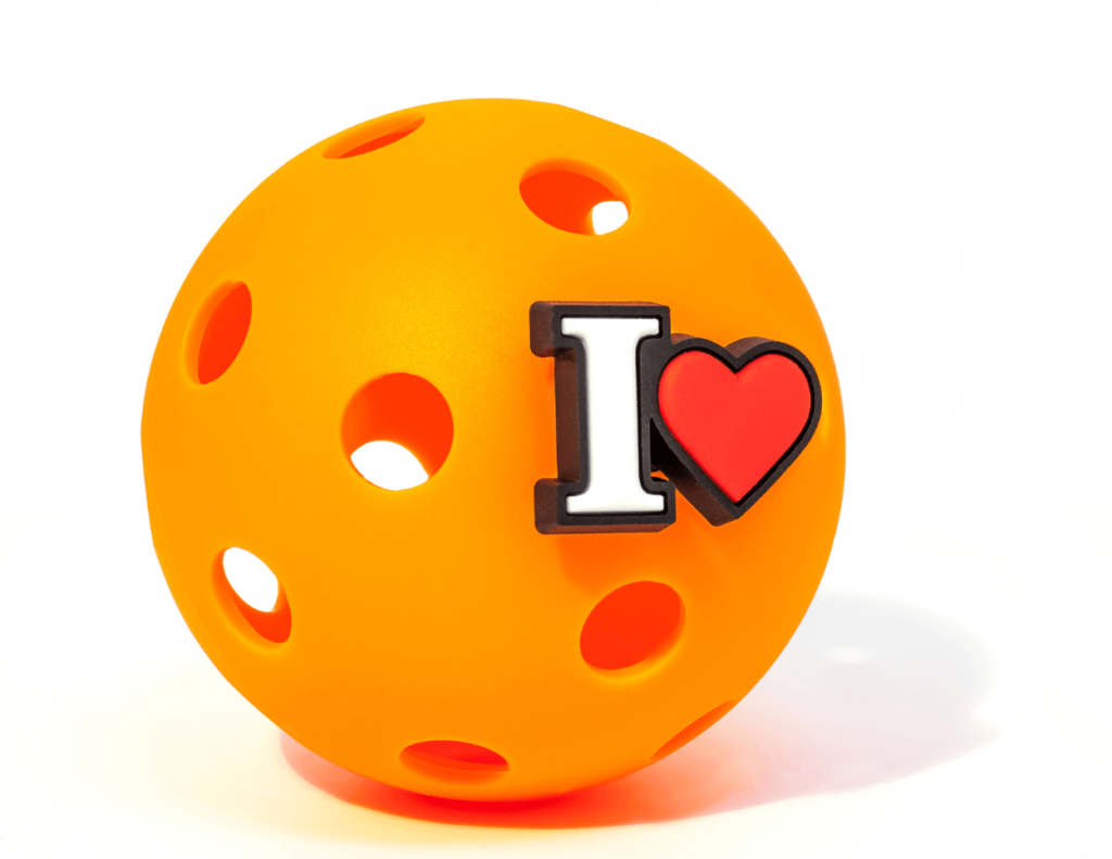 Orange pickel ball with I heart